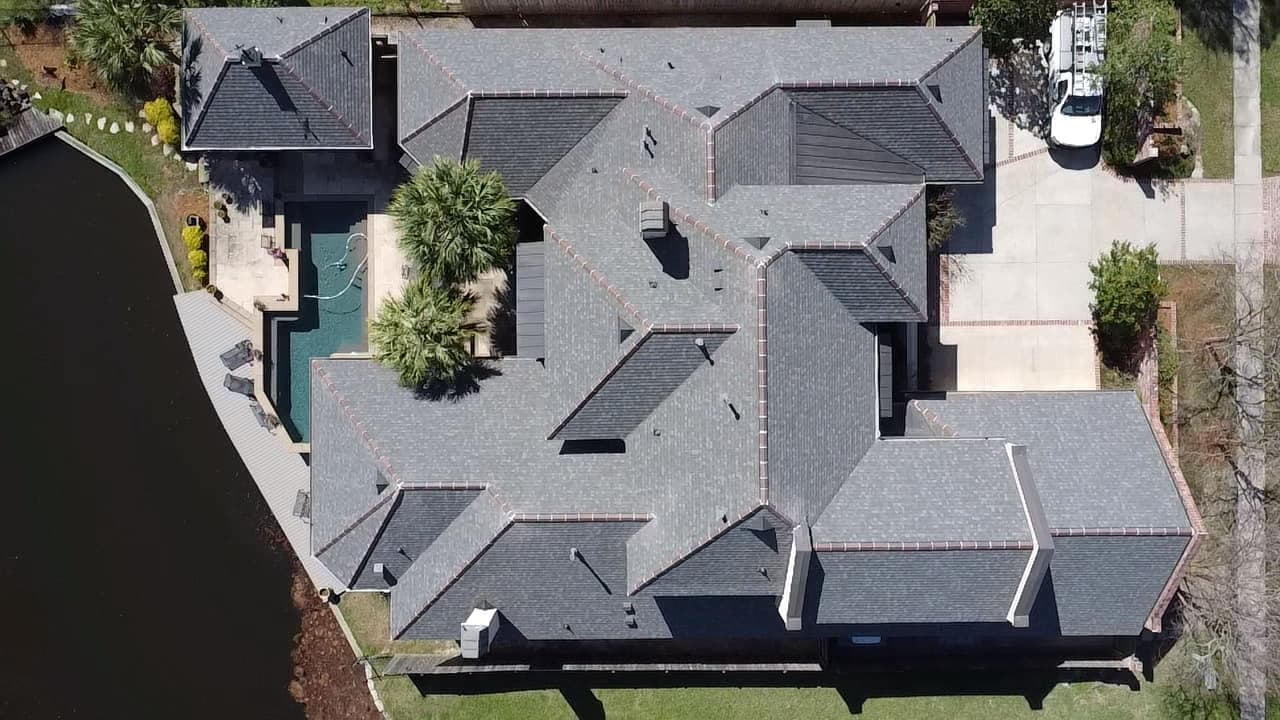 Completed roof replacement on a two-story home in Prairieville LA