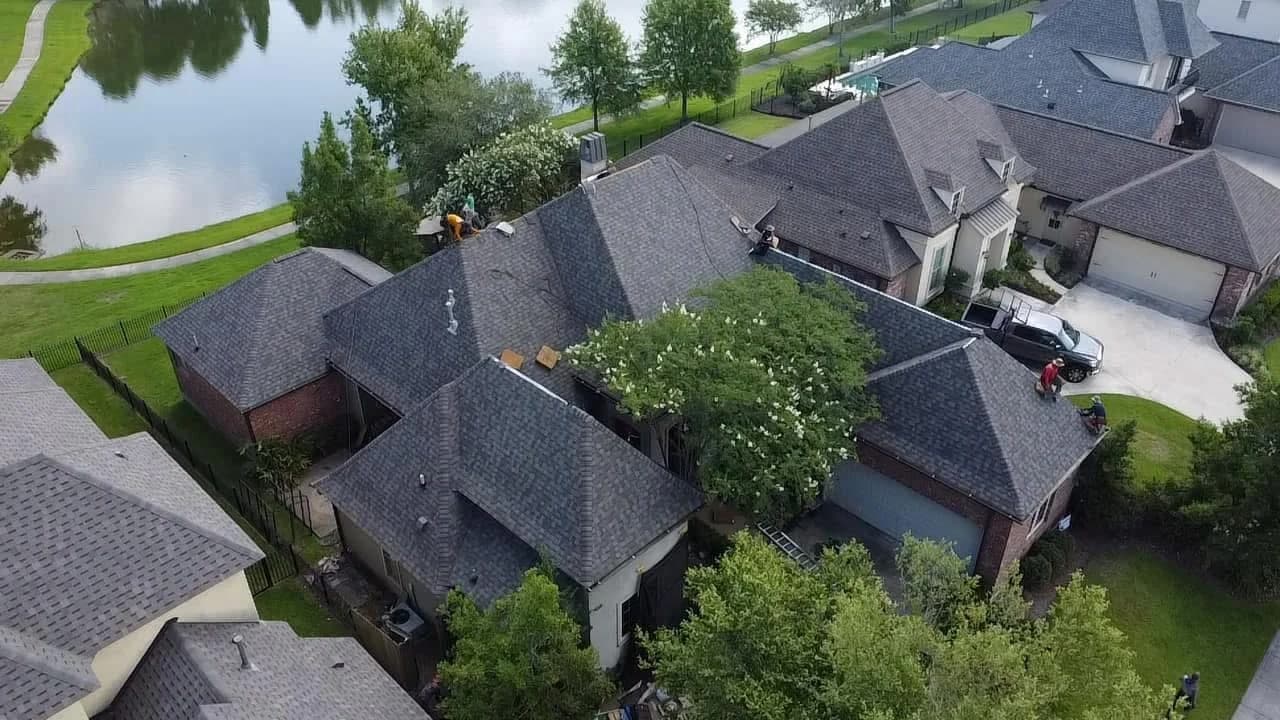 Aerial view of new shingle roof installation in Baton Rouge LA